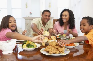 Family Having A Meal Together At Home