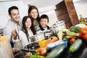 Happy family cooking together